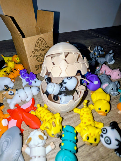 Eggmatik — 2 figurines d’animaux (réels ou fantastiques) à collectionner