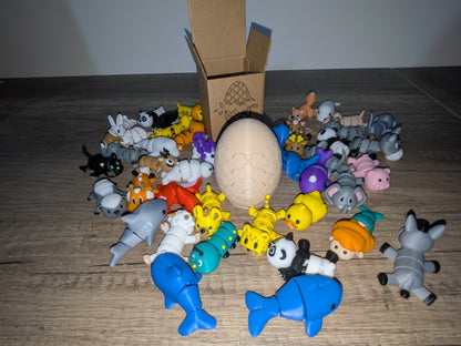 Eggmatik — 2 figurines d’animaux (réels ou fantastiques) à collectionner